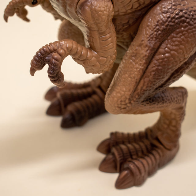 Arm Dropping Tyrannosaurus Rex Dinosaur Toy - PopFun